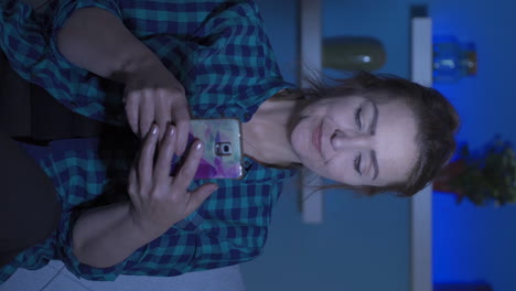 Vertical-video-of-Abandoned-woman.-Home-alone-and-depressed-at-night.
